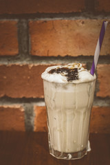 Gula Melaka Latte Gula Melaka, vanilla cream, coffee jelly in a tall glass