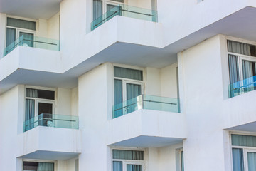 Fototapeta na wymiar white building facade exterior background of balcony terraces 