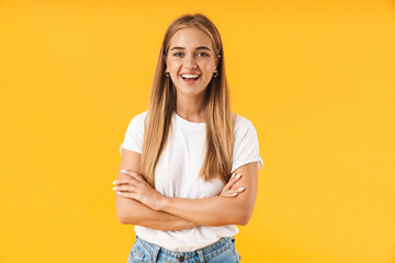 Cheerful young girl wearing casual clothing standing