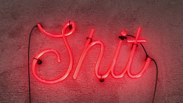 Bright Red Neon sign that says the word SHIT, this realistic sign starts off then it turns on with amazing flashing flickering effects, then after 30 seconds it flashes on and off and can be looped.