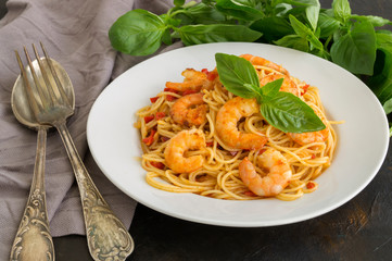 spaghetti and shrimp. style of Italian cuisine