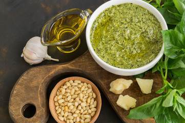 Traditional Italian pesto sauce. on dark background.