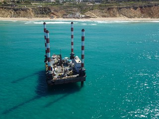 Aerial view of a temporary ocean drilling rig