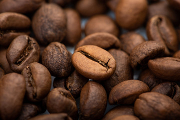 Coffee beans close-up background. Fresh roasted