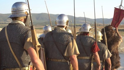 A Roman legion was a large military unit of the Roman army. Ancient Roman military clothing. The Roman Legions Marching to a Historical Battle - obrazy, fototapety, plakaty