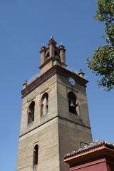 Fototapeta na wymiar Tower - bell tower in the center of ancient Seville