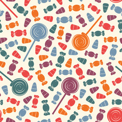 Seamless pattern with sweets. Halloween holiday background. Trick or treat wallpaper. Repeated candy silhouettes print