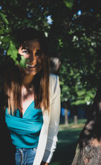 Girl with blue eyes in the nature