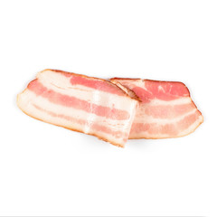 Rasher or smoked sliced bacon ready for cooking. One piece of pork belly isolated on white background, close-up.