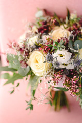 Obraz na płótnie Canvas Elegant bridal bouquet with soft tones and very bright.