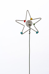 An iconic but simple Christmas star created out of wire and beads.