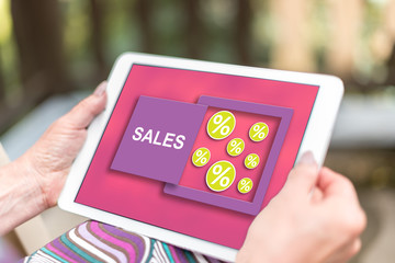 Sales and discounts concept on a tablet