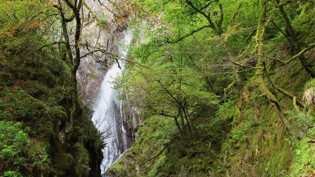 the grey mare's tail waterfall near kinlochleven in the argyll and lochaber region of the highlands of scotland near glencoe and fort william on the west highland way shot in autumn