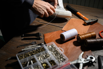 Men's shoes made of leather leather, the shoemaker workshop. shoemaker performs shoes