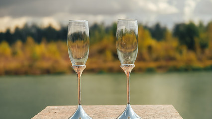 two glasses of champagne on table
