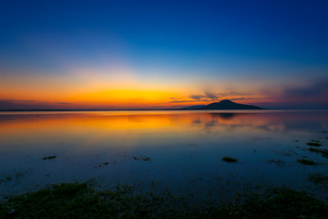 Fototapeta na wymiar Sunset in the Amazon Rainforest River Basin stock photo