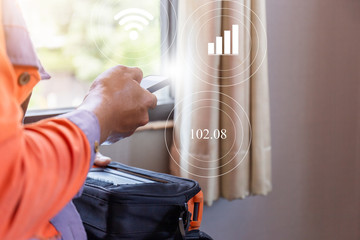 Internet technician man checking speedtest upload and download with tablet, Home IT network concept