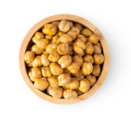 Chickpea in wood bowl isolated on white background. top view