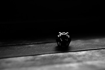 dice playing 20 faces on a wooden table