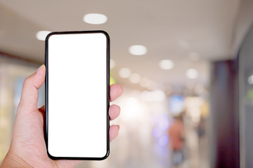 Close up Woman holding blank screen mock up mobile phone.