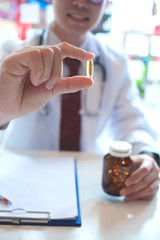 Fish Oil Omega 3 in the doctor's hand.