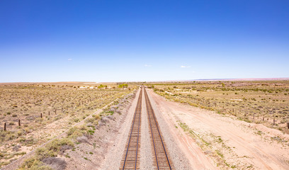 Fototapeta na wymiar Railway tracks, desert background, Arizona USA