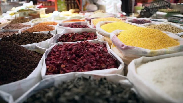 Pan Right to Left: Various Grains in Sacks Found in the Market - Erlian, Mongolia