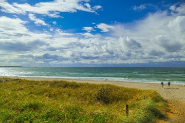 A beautiful summer day at the Baltic Sea with sun, clouds, wind.