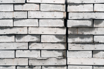 Pile of cemented concrete bricks