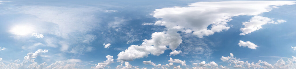 Seamless cloudy blue sky hdri panorama 360 degrees angle view with zenith and beautiful clouds for use in 3d graphics as sky dome
