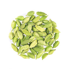 Cardamom pods isolated on white background. Green cardamon seeds. Clipping path. Top view.