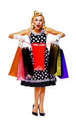Full body of happy excited woman in pin up style dress in polka dot, holding shopping bags, isolated over white