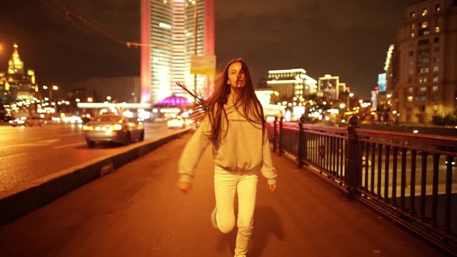 Young woman in jeans and jacket Street