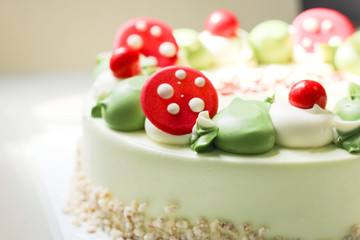Close up of pandan cake with green color cream and sugar clay.