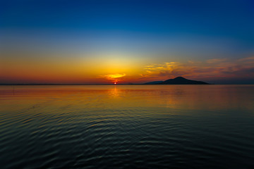 Sunset in the Amazon Rainforest River Basin stock photo