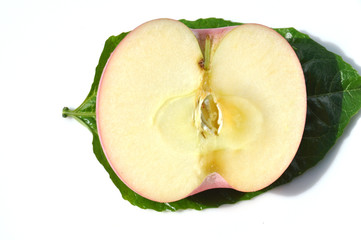 half of apple on white background
