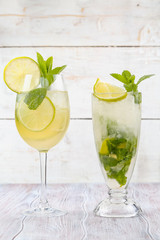 Fresh summer drink. Fresh lemonade. Lemonade on a light wooden background