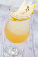 Fresh summer drink. pear lemonade. Fresh lemonade. Lemonade on a light wooden background