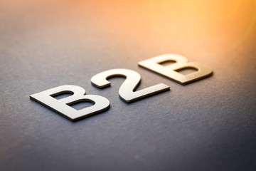 Word B2B written with white solid letters