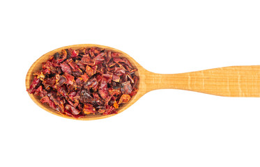 Dry red pepper in spoon