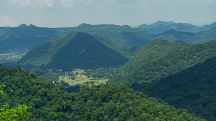 View of the city in the middle of mountains and forests