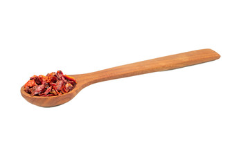 Dry red pepper in spoon
