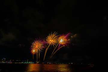 Colorful fireworks on Pattaya city at night, Pattaya Thailand.