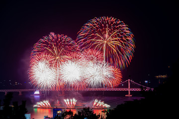 Colorful firework festival at Gwangan Bridge in Gwangalli beach, Busan South Korea.