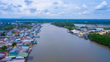 View of Pak Nam Prasae in Rayong province, Thailand. This area have many fisher village along the river.