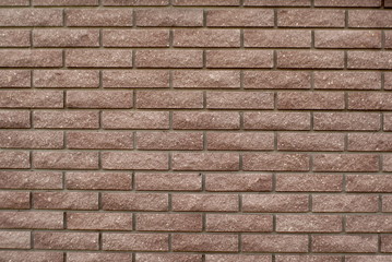 Texture of brown brick wall. Background of brown brick wall