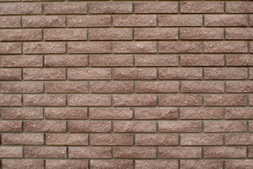 Texture of brown brick wall. Background of brown brick wall