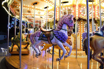 Fototapeta na wymiar A Classic Carousel in a Fair 1