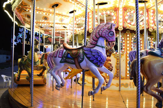 A Classic Carousel in a Fair 1