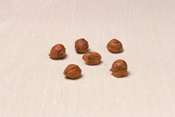 Kernel nuts Vegetarian food hazelnut on a rough cloth close up
